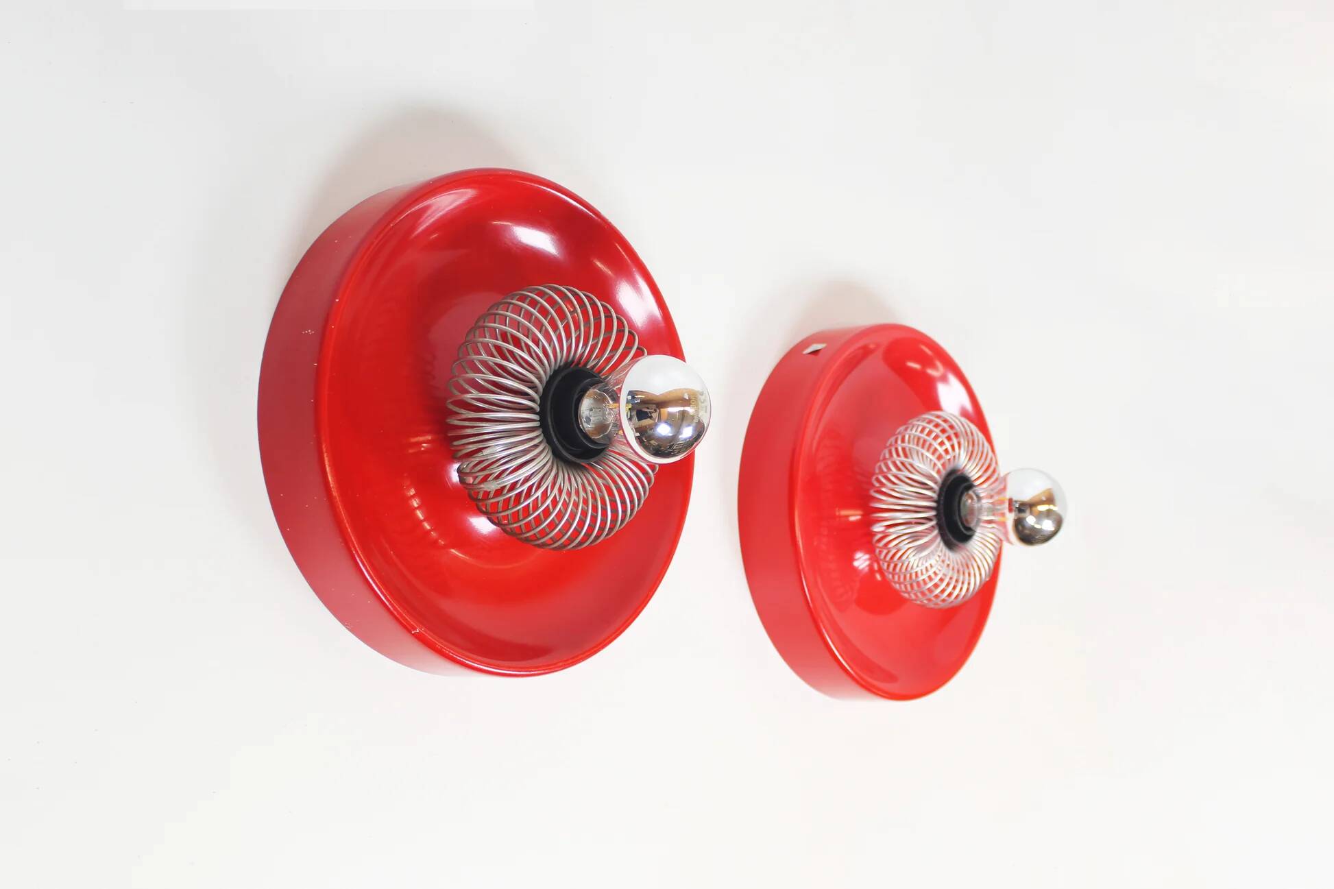 Pair of Space Age 'Spring' wall lamps by ELEKTROFÉM, Hungary, 1970s.
