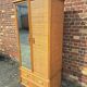 Large rattan wardrobe with mirror