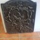 Plaque de cheminée ancienne en fonte
