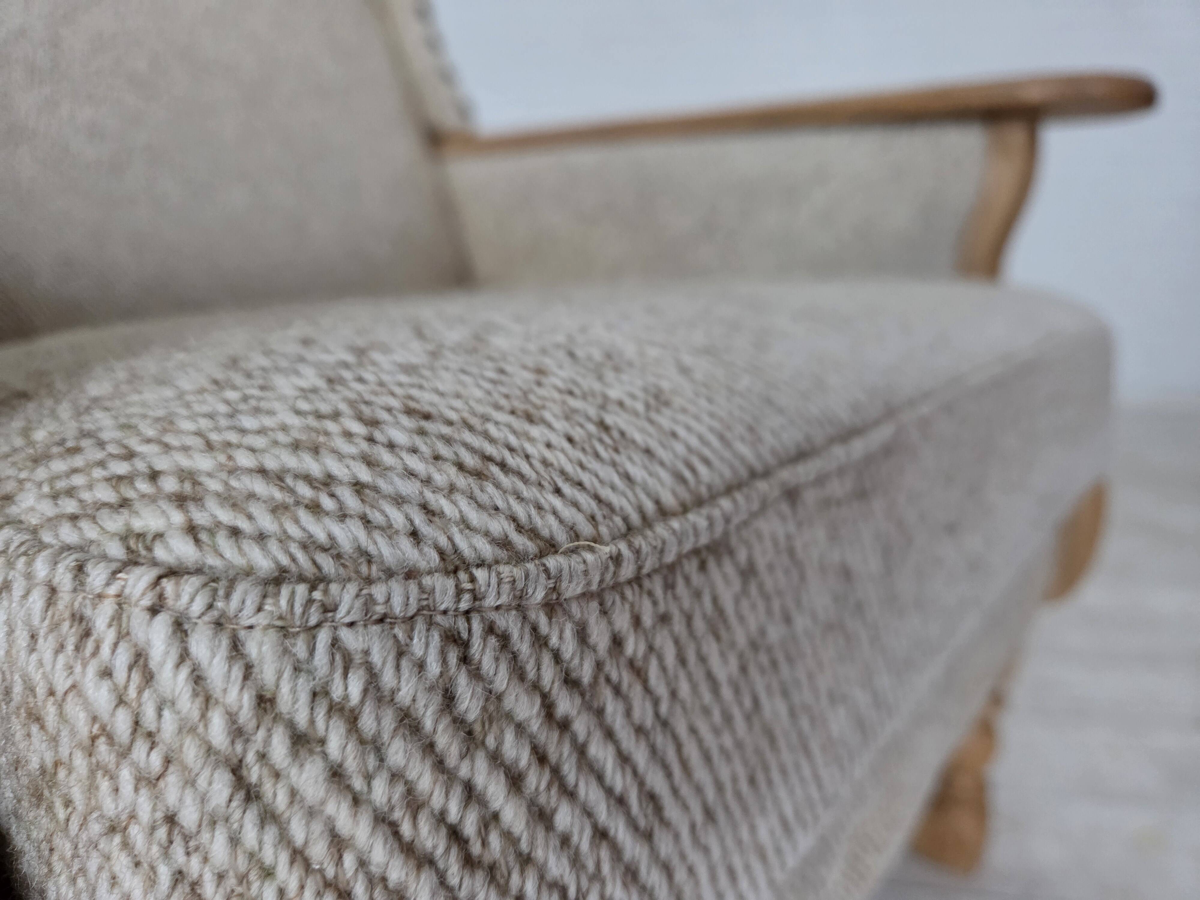 1970s, Danish highback armchair, furniture wool, solid oak wood.