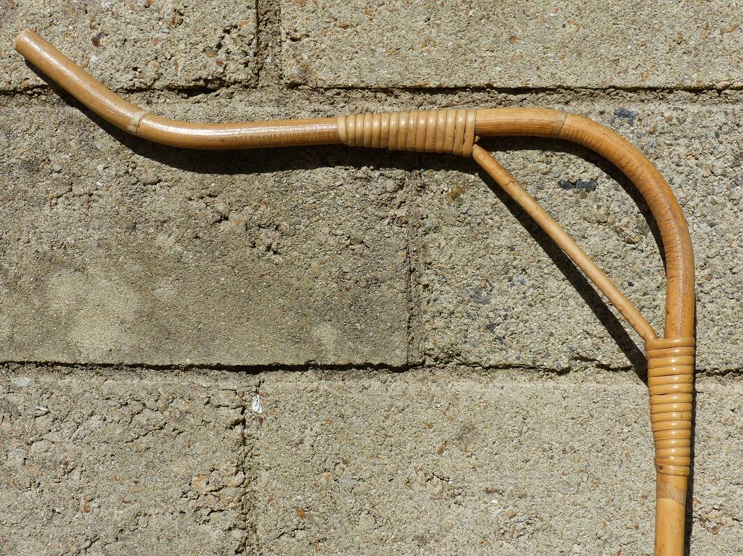 Children's bed in vintage rattan from the 1950s
