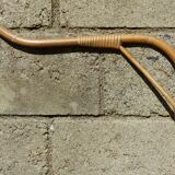 Children's bed in vintage rattan from the 1950s