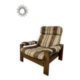 Vintage 1970s design armchair made of wood and fabric.