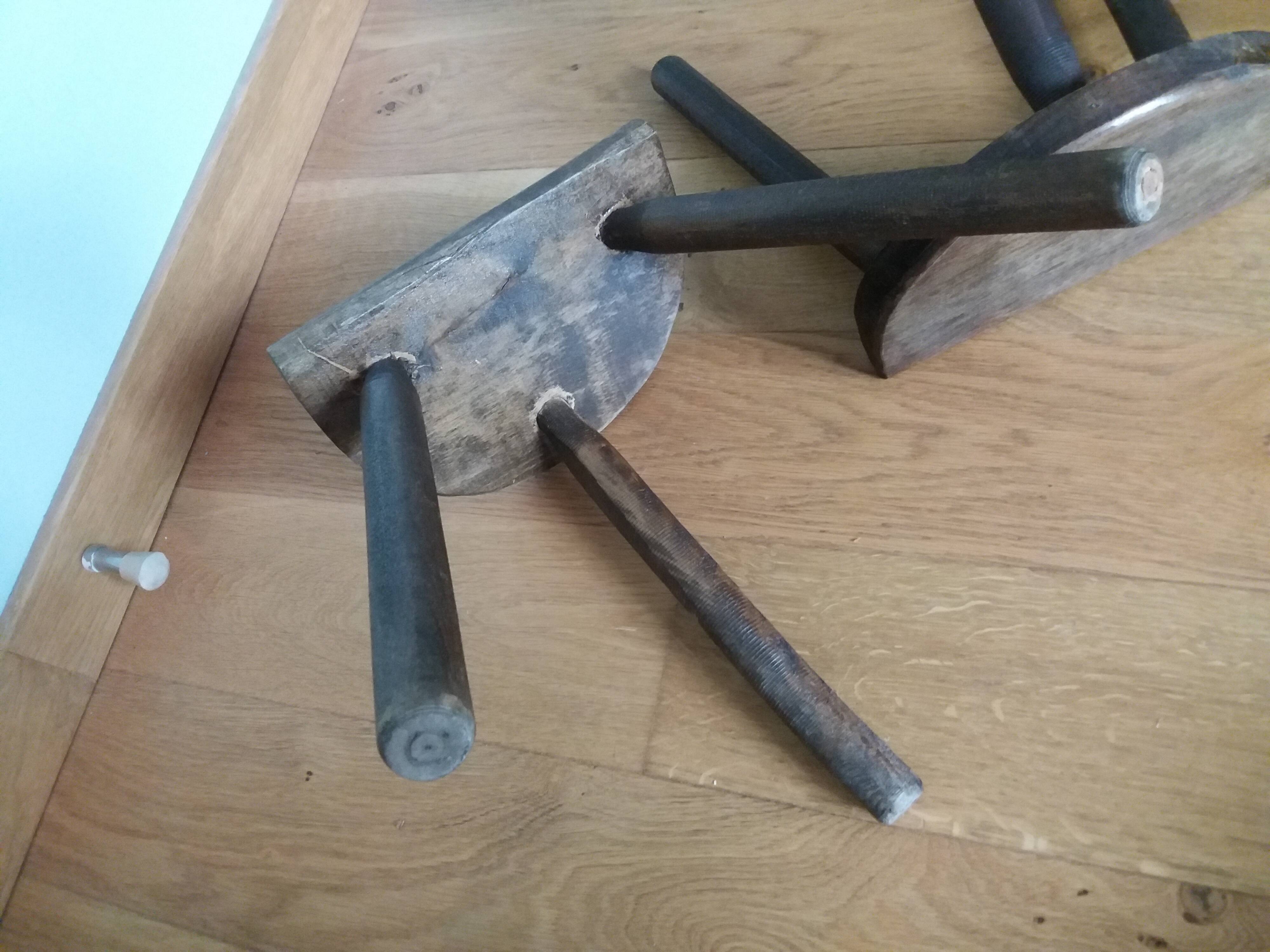 Cowherd tripod stools