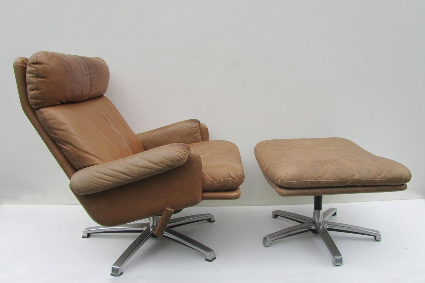 Mid-century vintage high back leather Swivel Armchair with Ottoman, 1970s