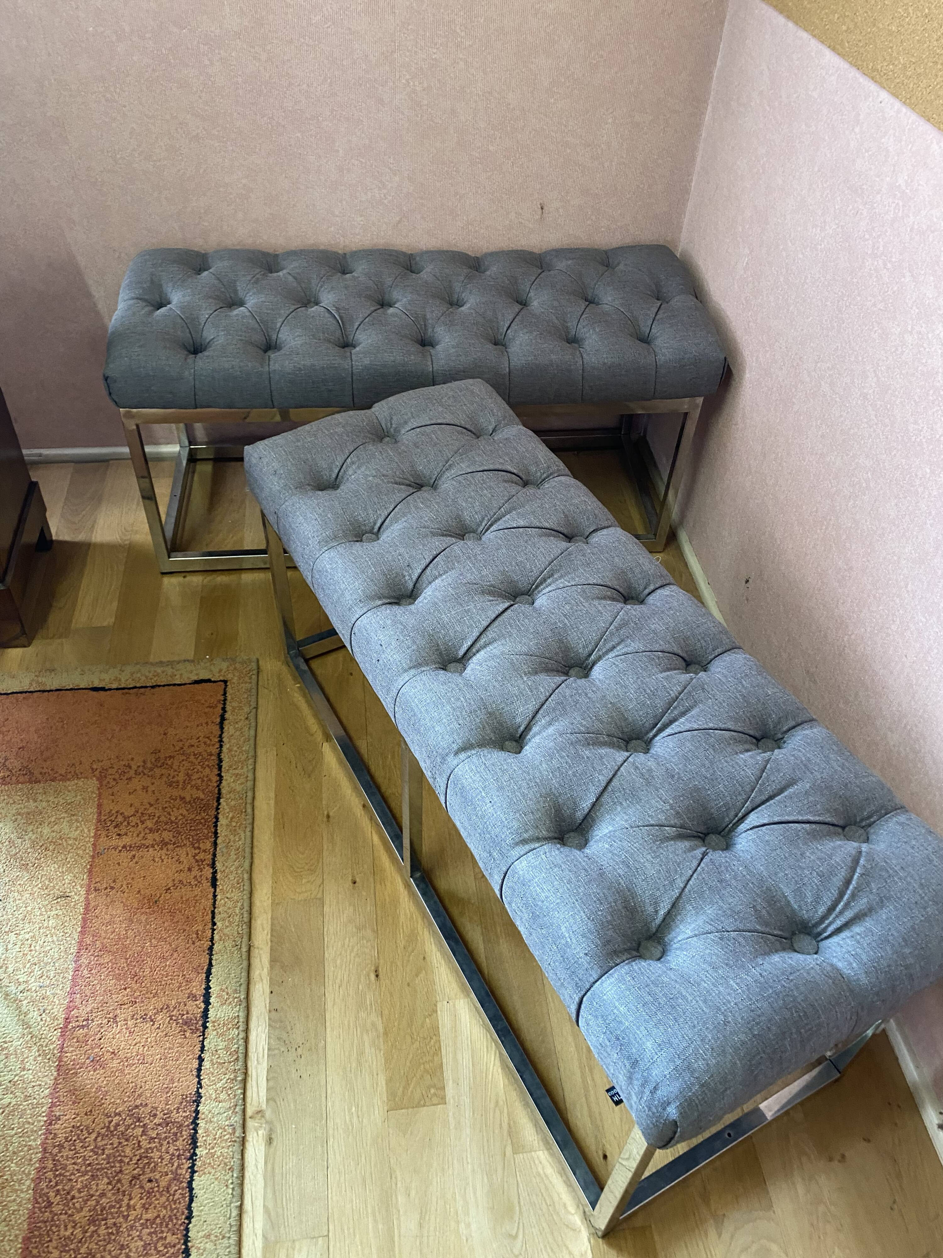 Pair of benches in chrome metal and padded gray fabric