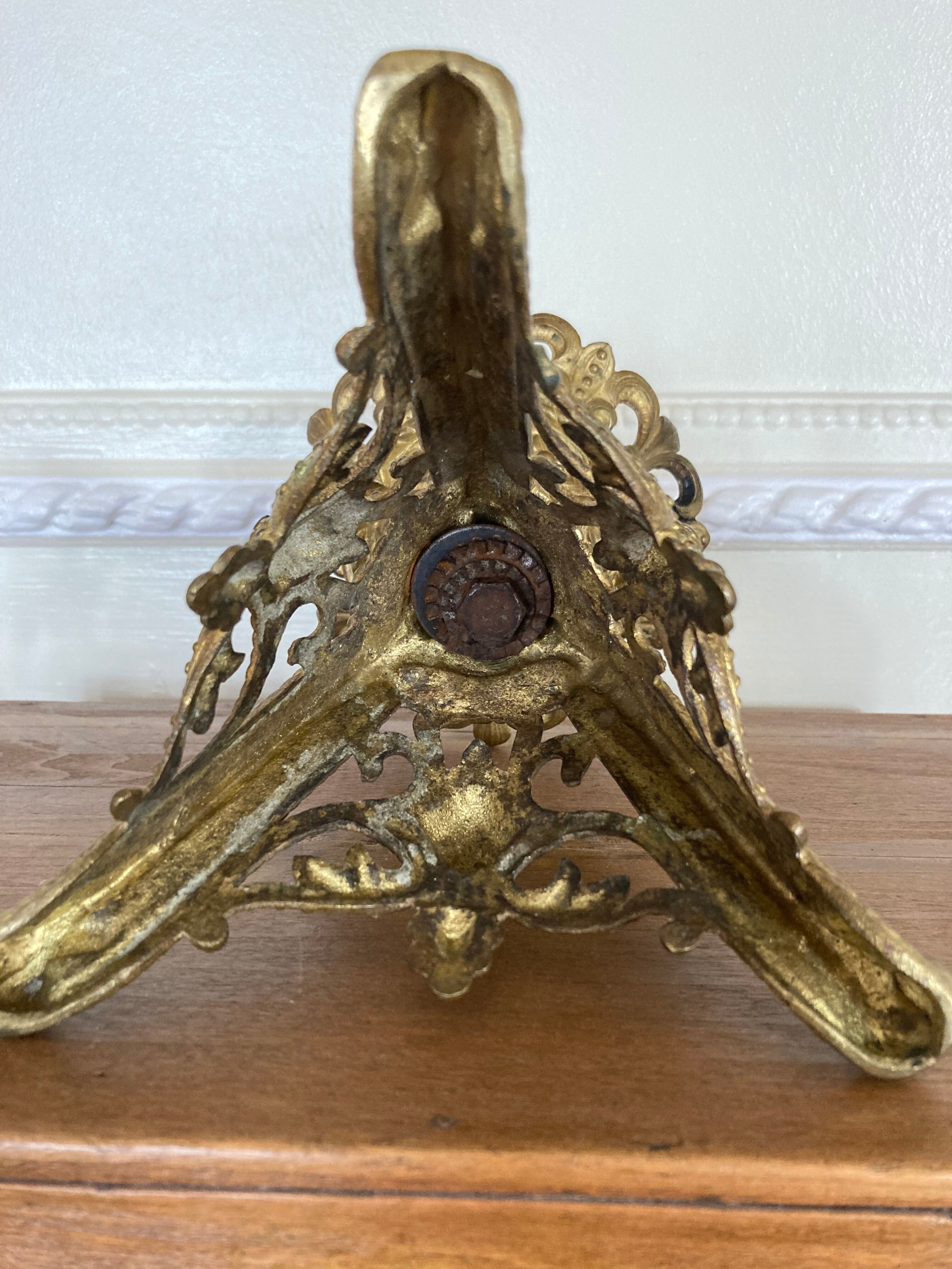 Candle holder church in gilded metal