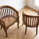 Pair of antique wooden and caned armchairs