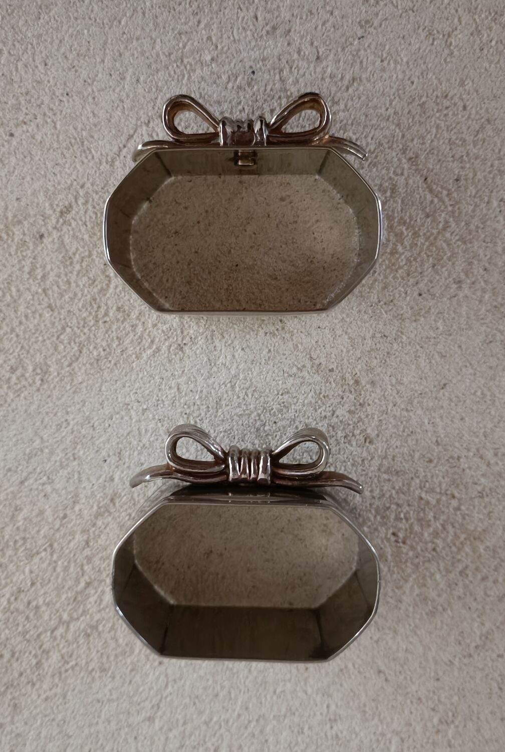 2 silver metal towel rings