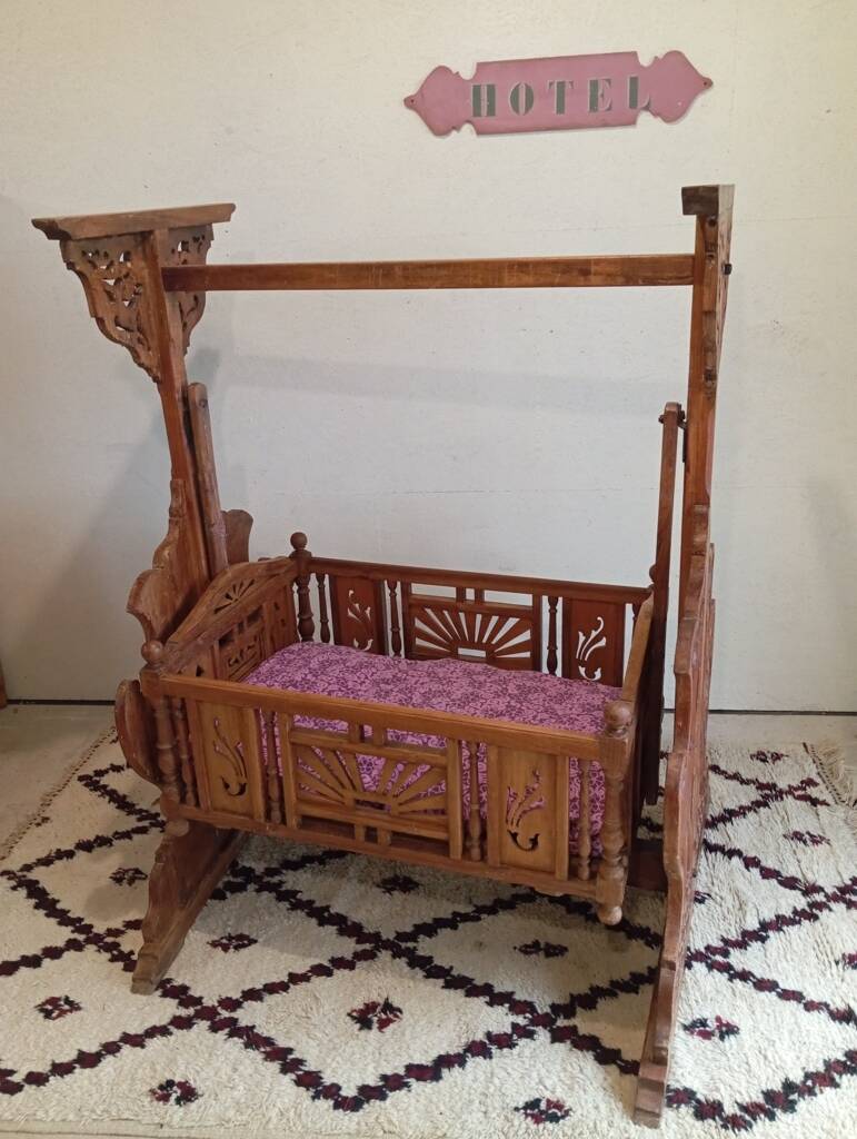 Solid teak carved swing cradle