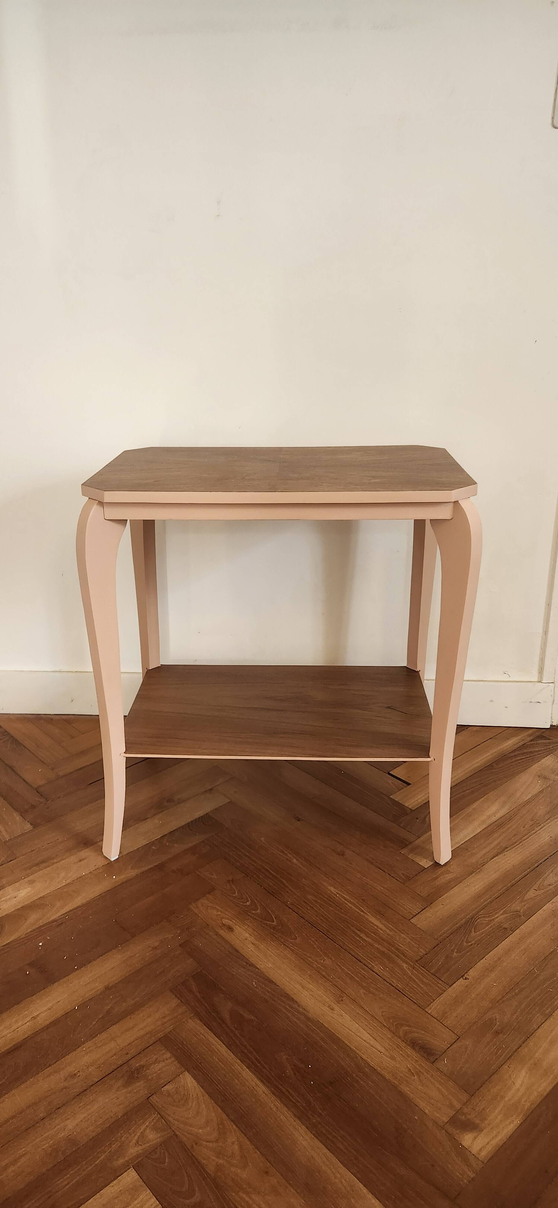 Side table with curved pink legs