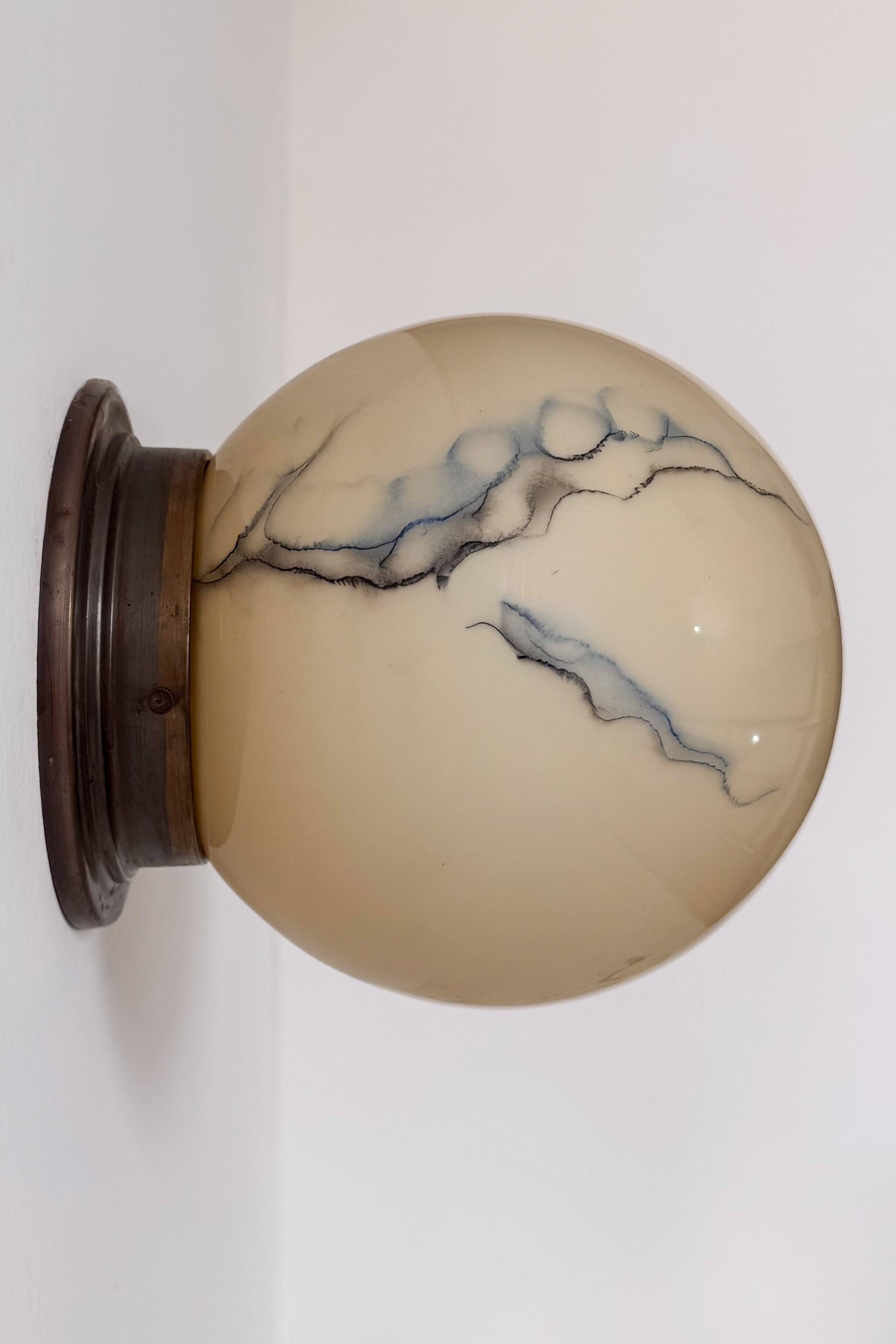 Pair of vintage wall lights, brass and "marbled" opaline, France, 1940.