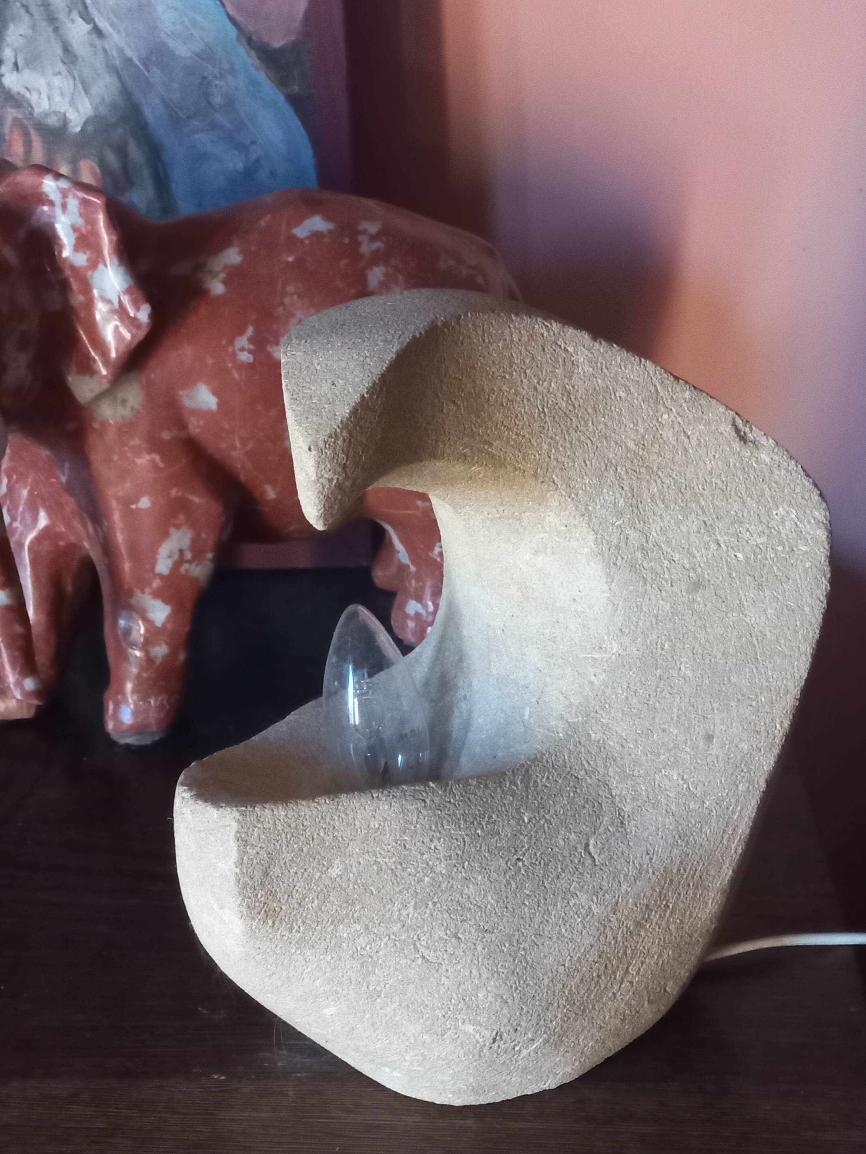 Sculpted stone lamp from the 1970s, signed.