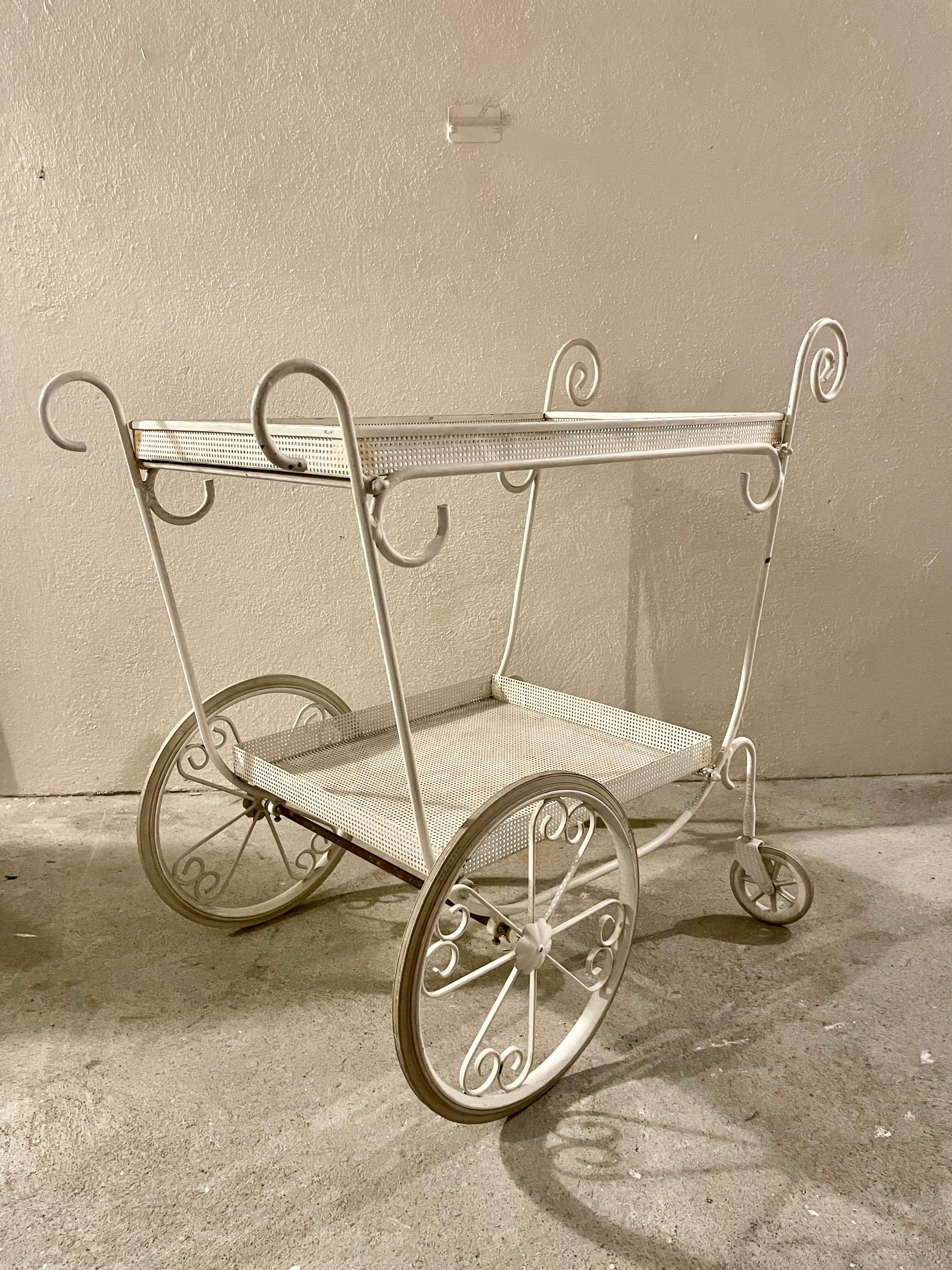 White perforated metal trolley