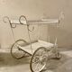 White perforated metal trolley
