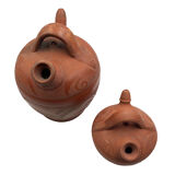 Two terracotta gargoyles