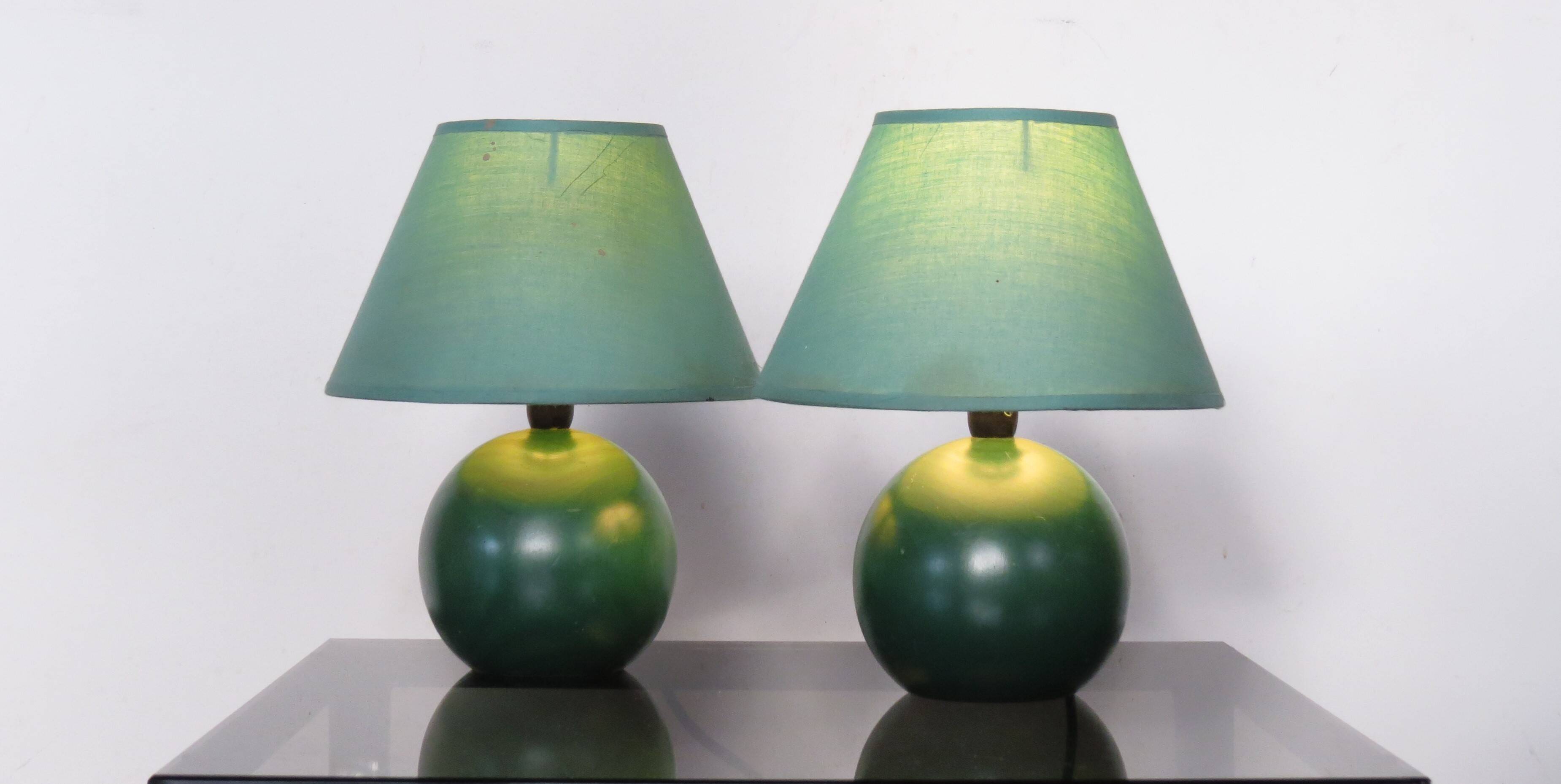 Pair of small green wooden ball lamps