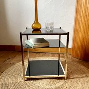 Gold metal side table, in the style of Maison Jansen, 1970s.
