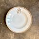 Gold monogrammed porcelain deep plate "F"