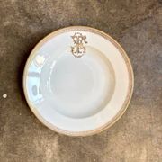 Gold monogrammed porcelain deep plate "F"