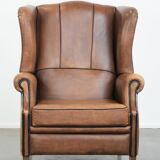 Sheepskin wingback armchair with beautiful colours in good condition