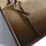 Suitcase of leather with labels of palaces