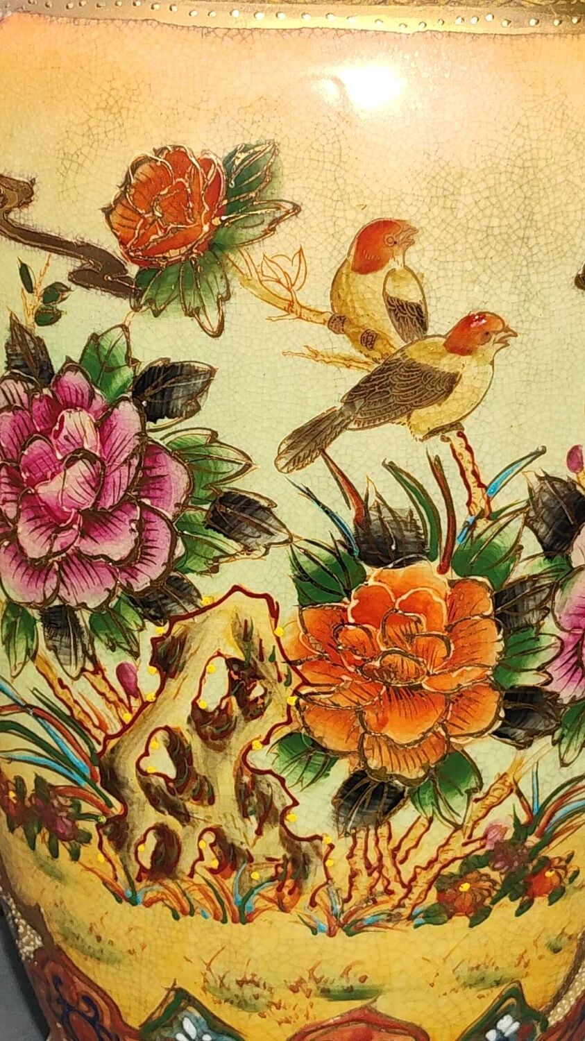 Vase signed Satsuma. Birds/Butterflies/floral patterns on a wild nature background. Gold highlights