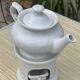Théière en porcelaine blanche
