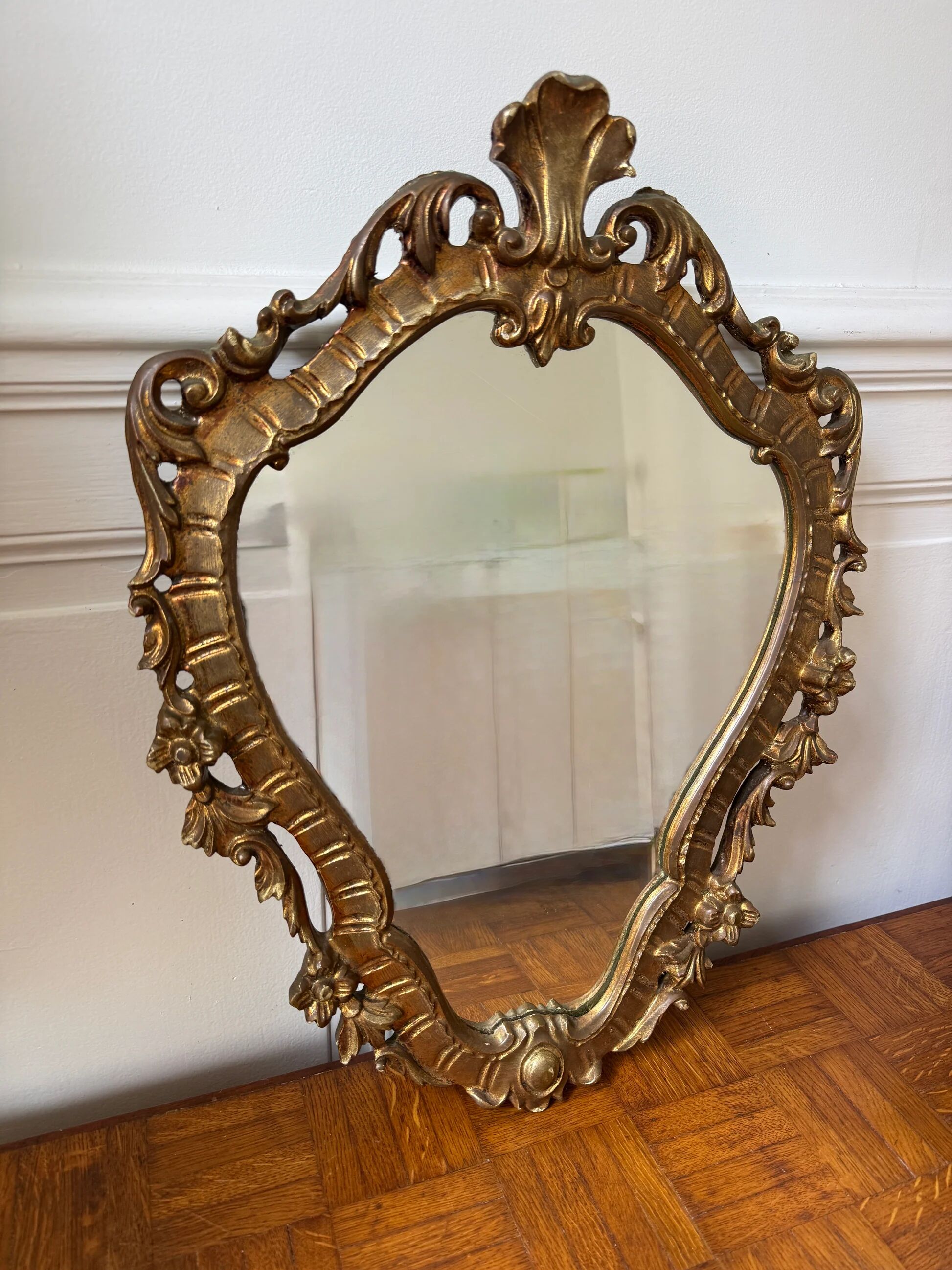 Golden rococo wall mirror