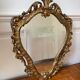 Golden rococo wall mirror
