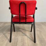 Red fabric chair with black base