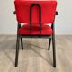 Red fabric chair with black base