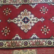 Small Persian rug from the 1960s.