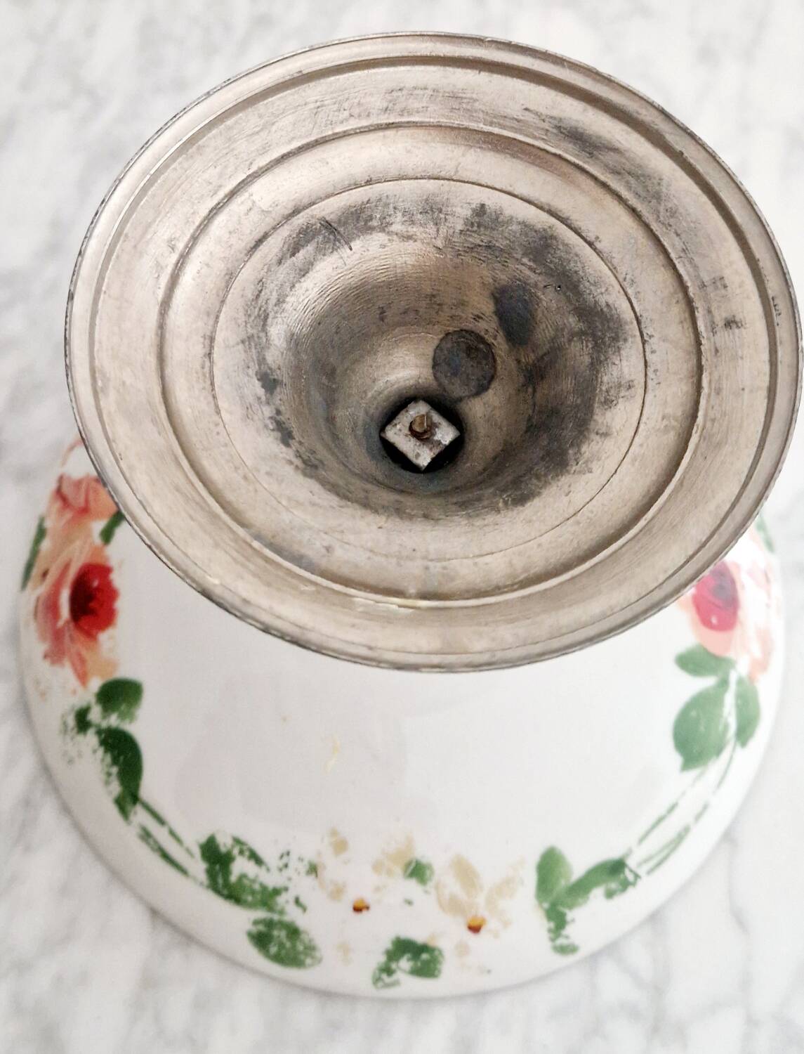 Porcelain cup on silver metal foot