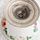 Porcelain cup on silver metal foot