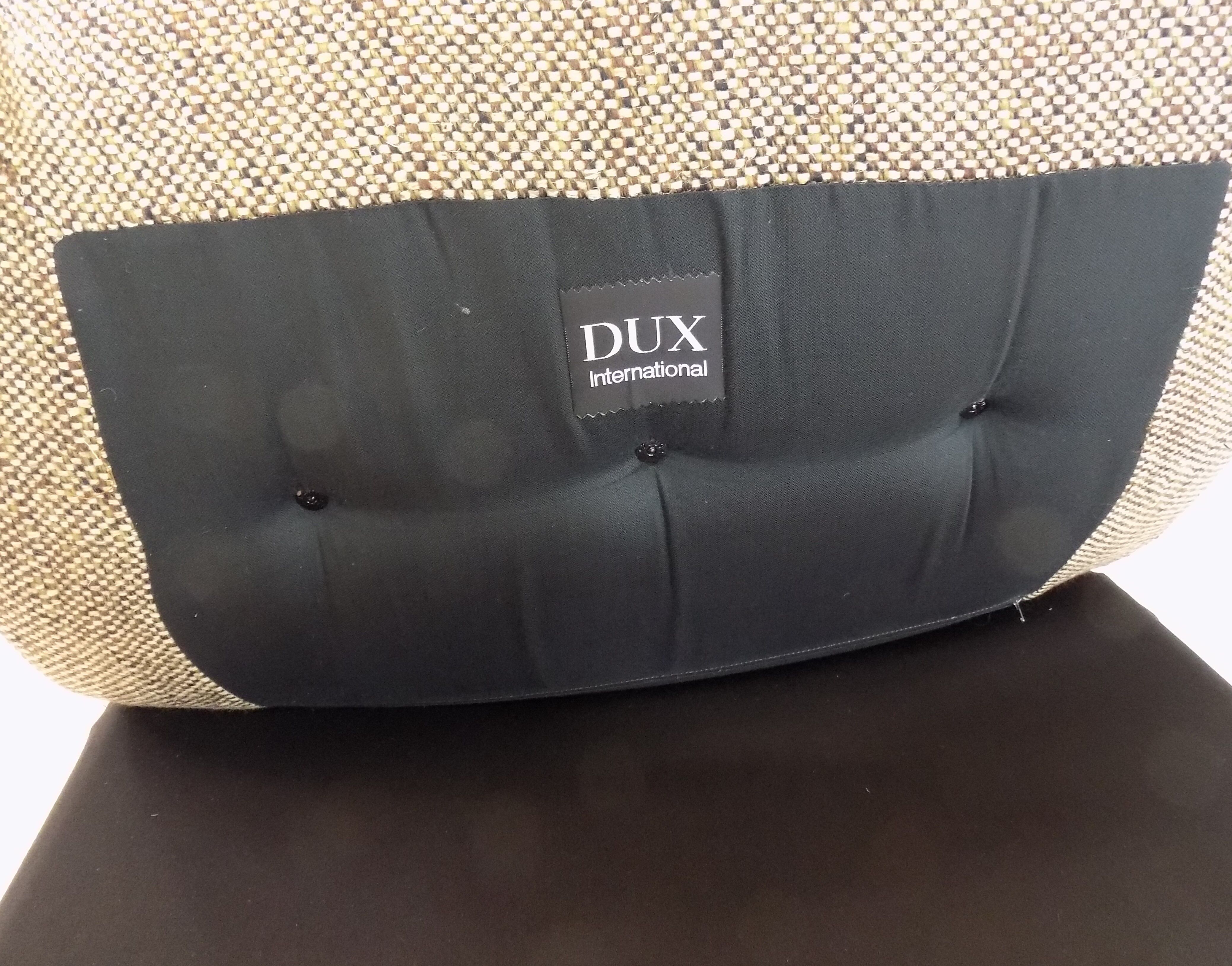 DUX International lounge chair pair