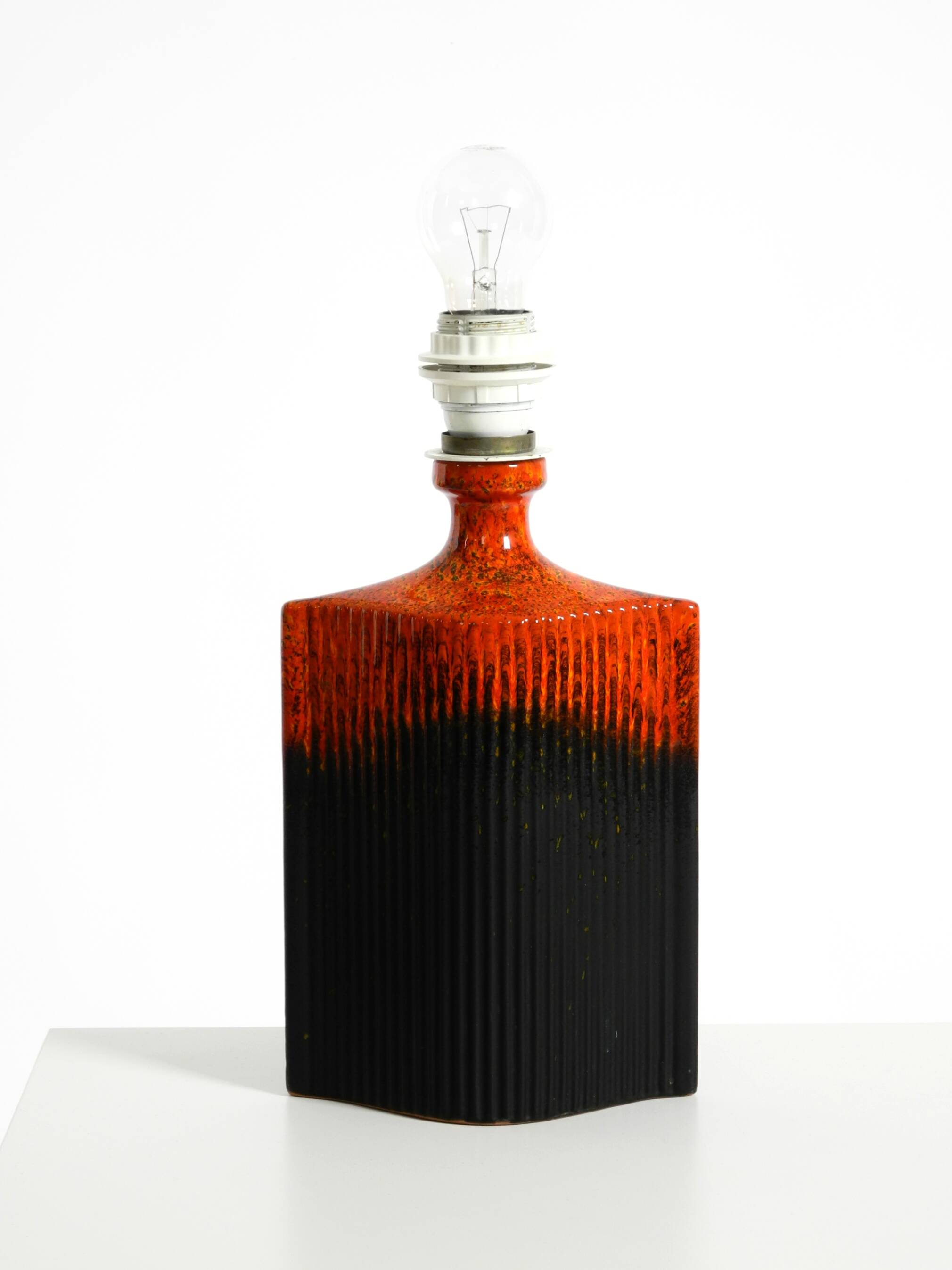 Unique 1960s ceramic table lamp in red and black by Kaiser Leuchten