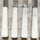 8 antique stainless knives