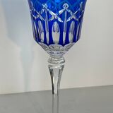 Set of twelve glasses in crystal tinted in different colours and cut with stars.