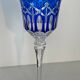 Set of twelve glasses in crystal tinted in different colours and cut with stars.