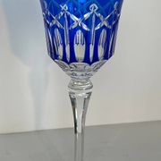 Set of twelve glasses in crystal tinted in different colours and cut with stars.