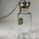 Old glass and openwork pewter jar for fruit with brandy