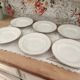 Set of 6 deep plates in fine porcelain from Bohemia with a gold rim.