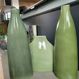 Trio of green enamelled vases