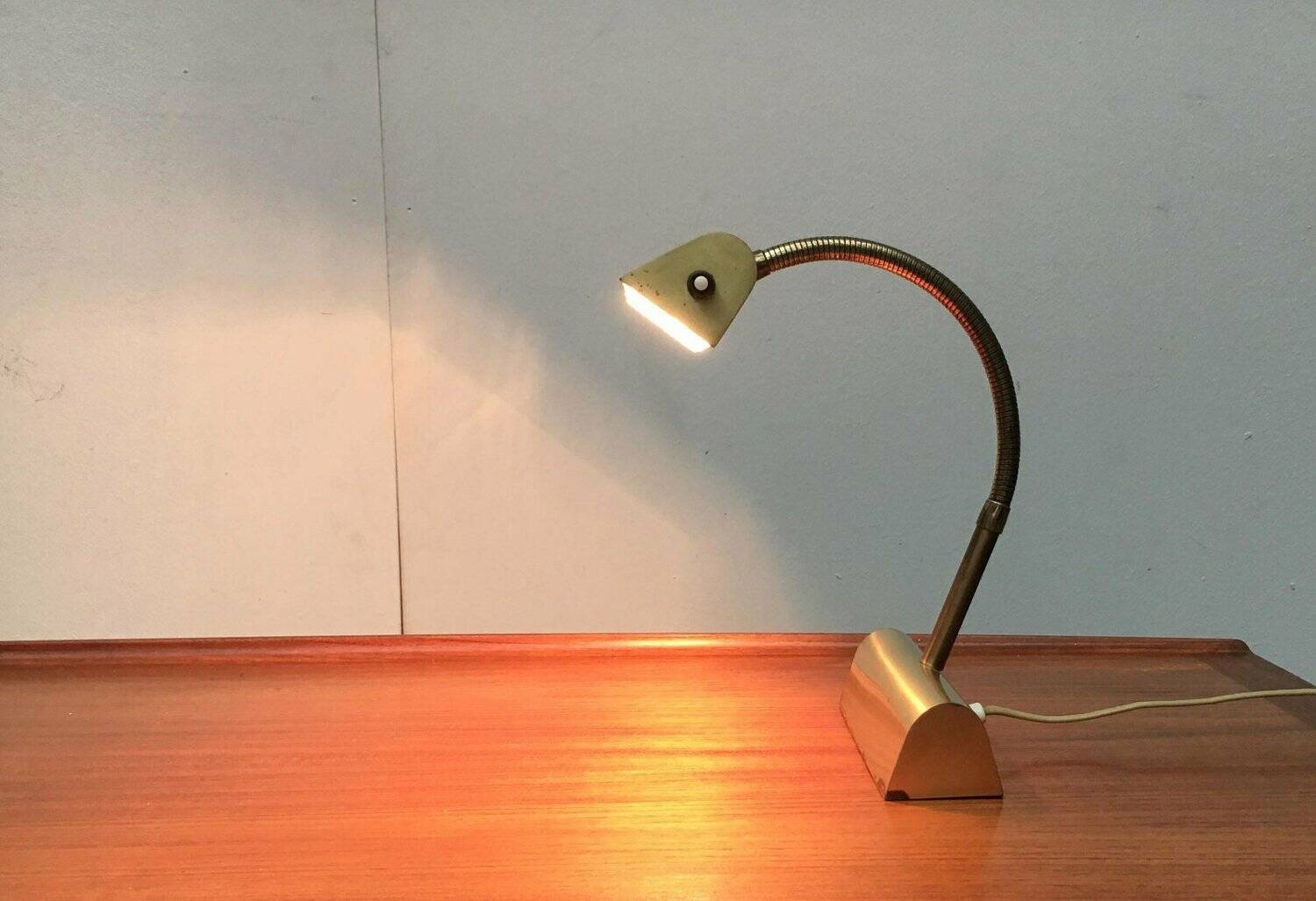 Mid-century brass swan neck table lamp in Hollywood Regency style from the 1960s.