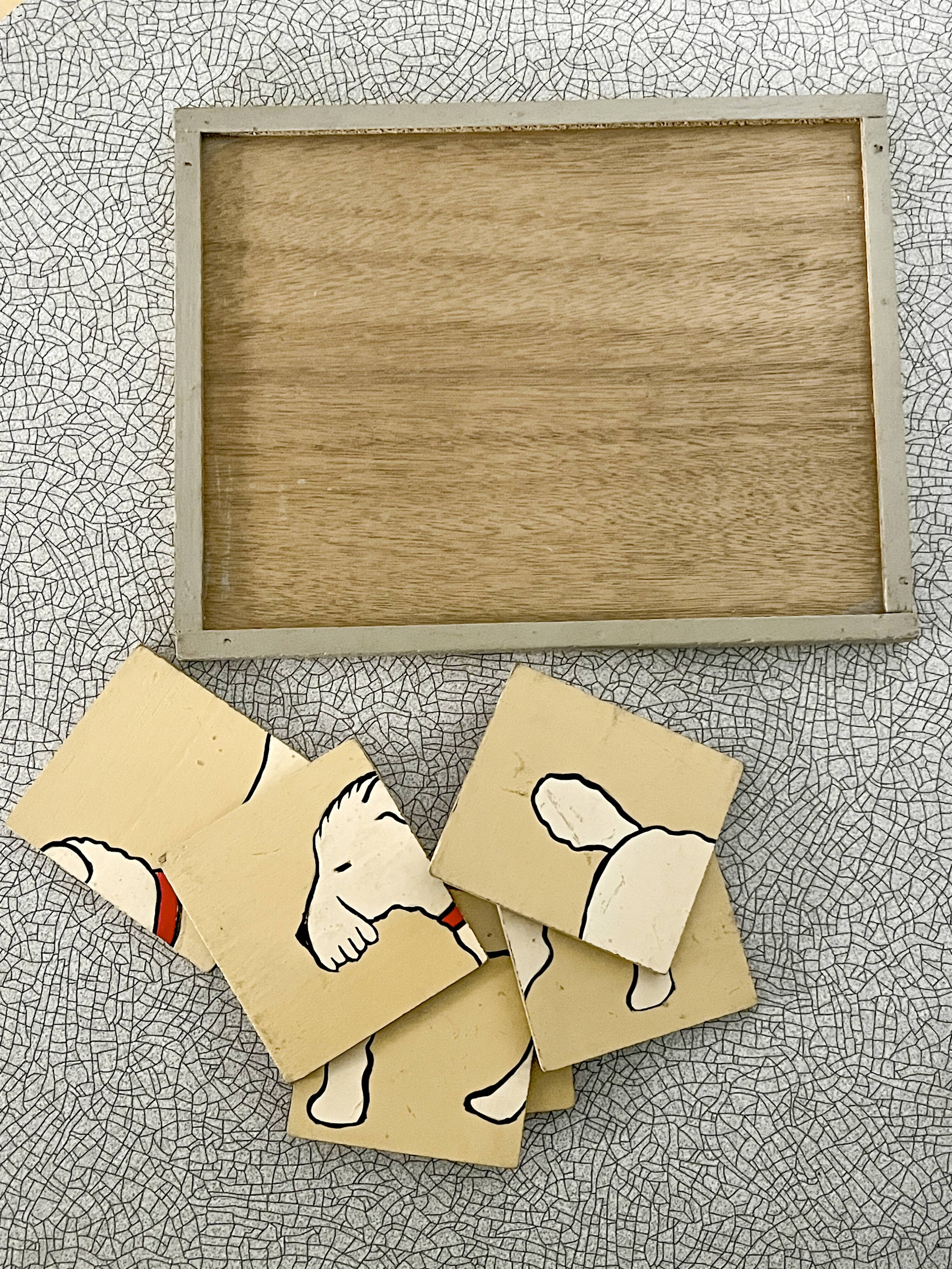 Wooden puzzle frame from the 1930s/40s depicting a dog.