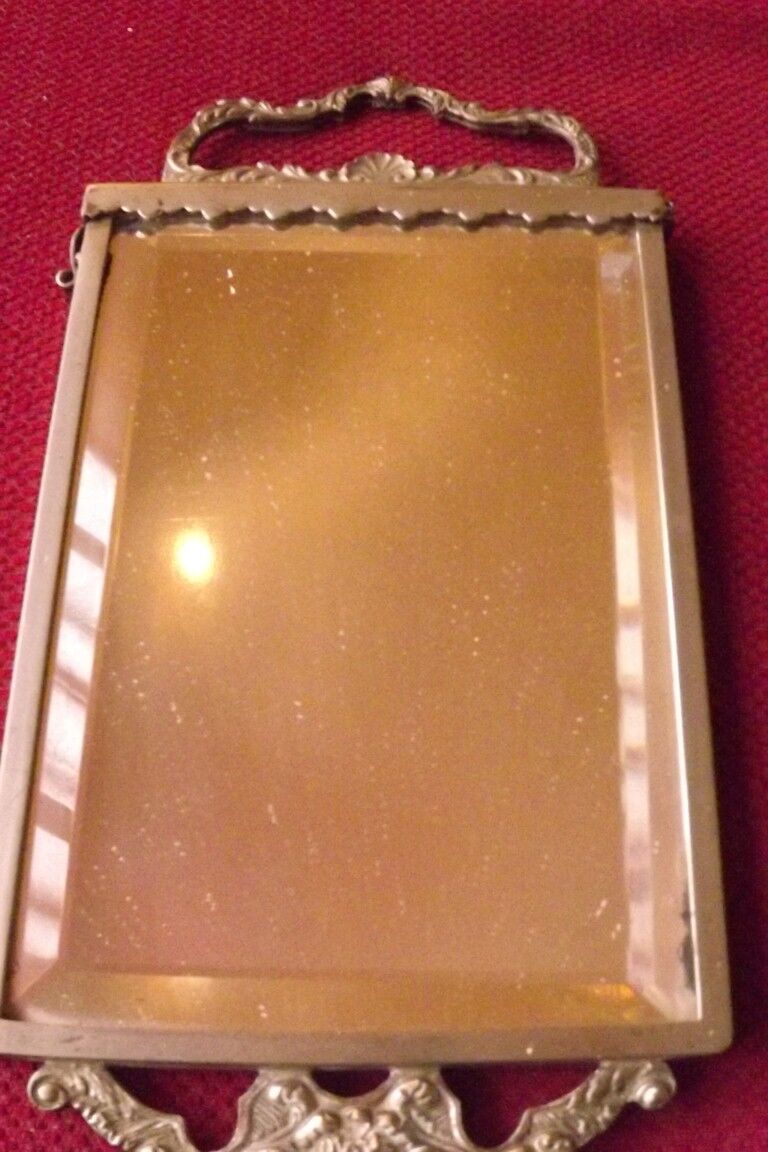 Mirror opposite hand 1900 silver metal