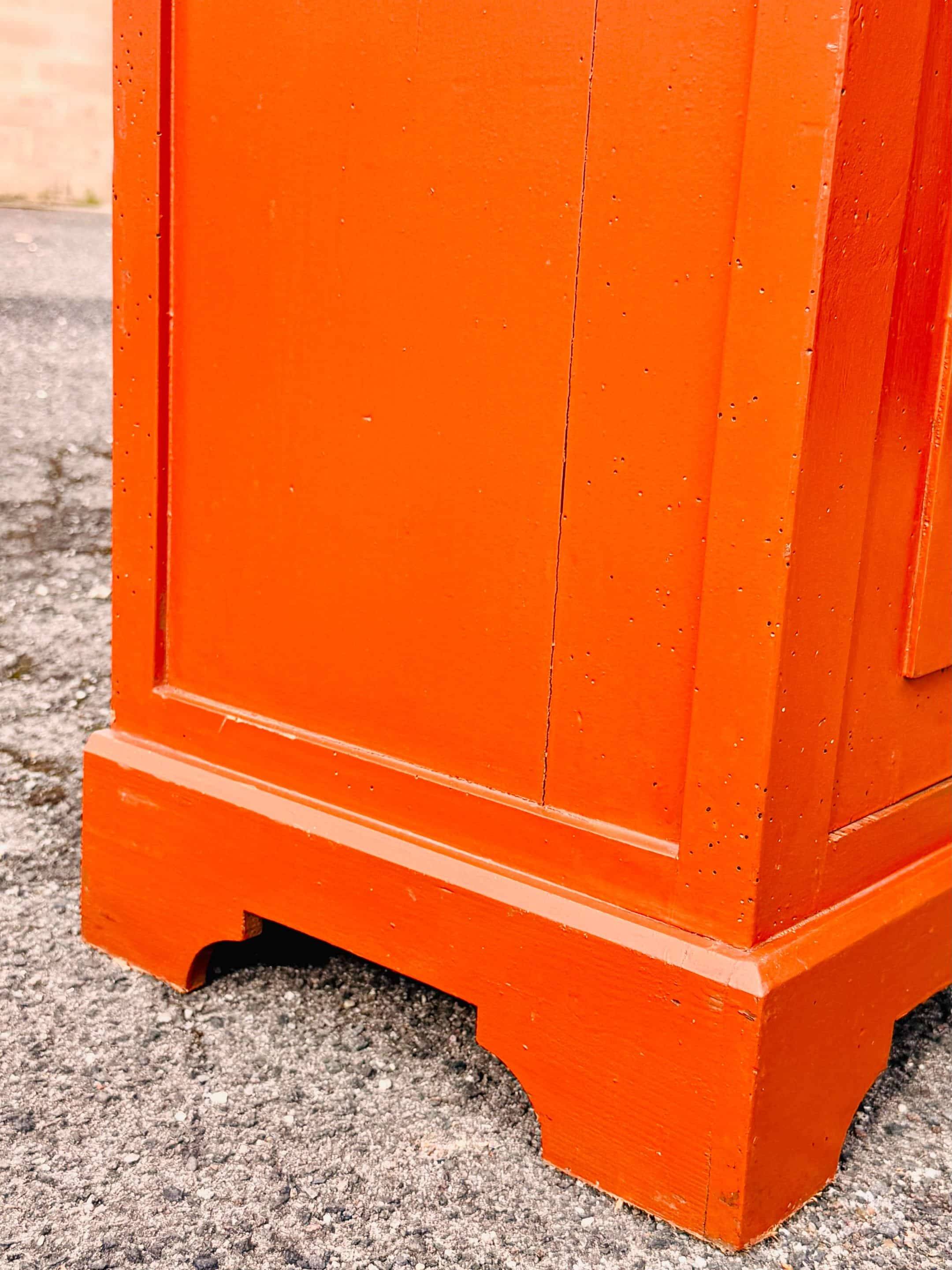 Old terracotta-colored bonnet maker