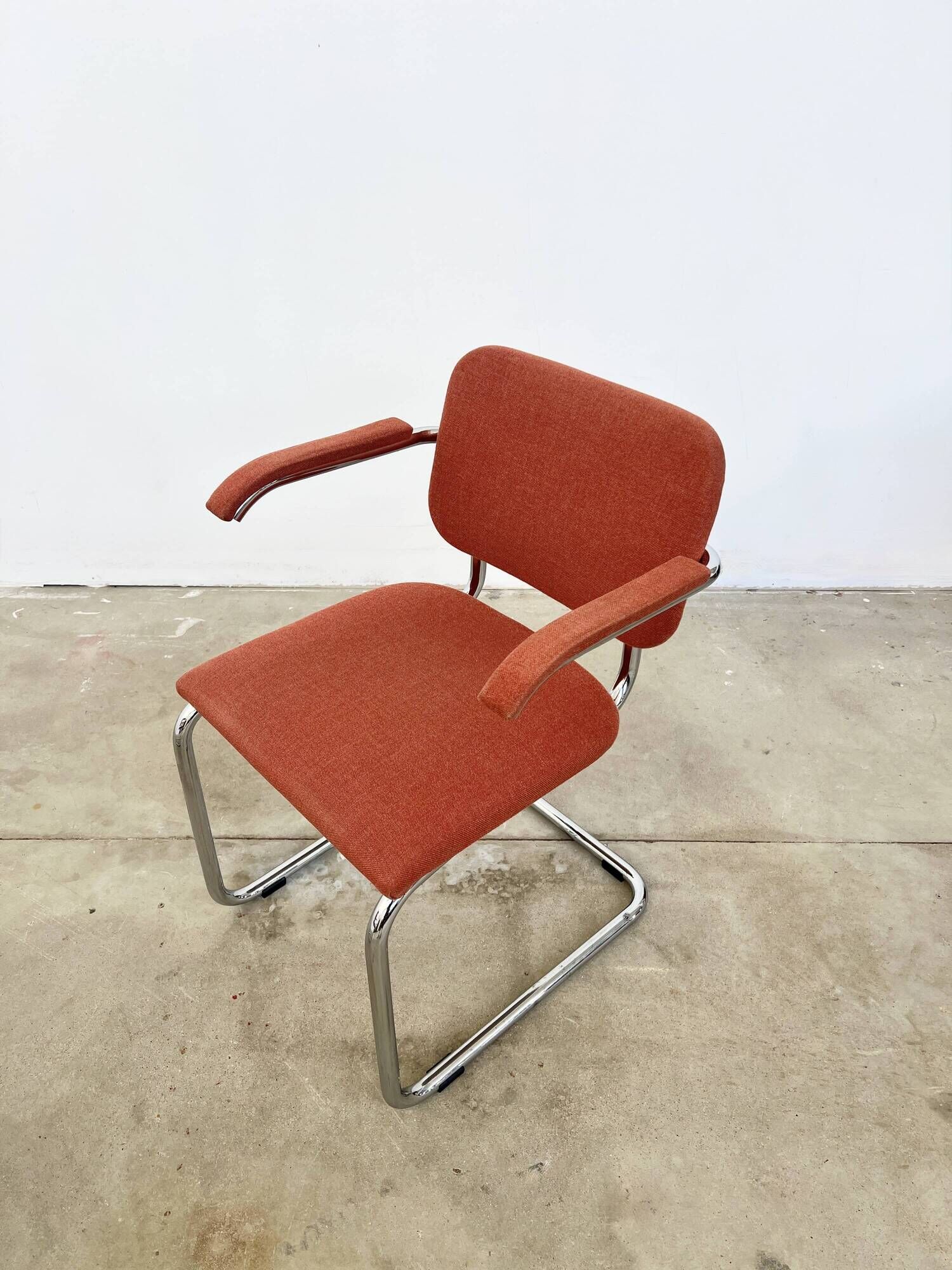 Pair of Marcel Breuer B64 Knoll armchairs in coral fabric
