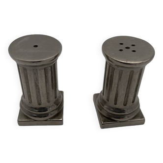 Column salt and pepper shakers.